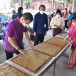 ประเพณีสารทลาว งานกวนกระยาสารท